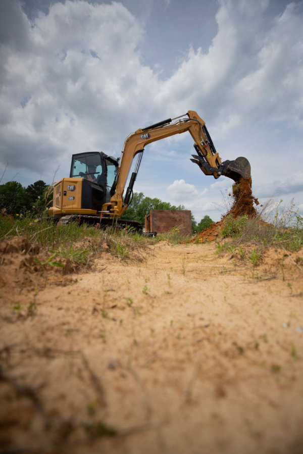 Mini Excavator on hill